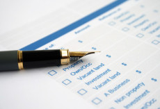 Private Building Control vs Local Authority Building Control Building Control - Fountain pen laying on checklist