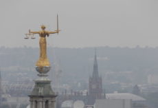 Can A Surveyor Be An Expert Witness? Statue representing justice